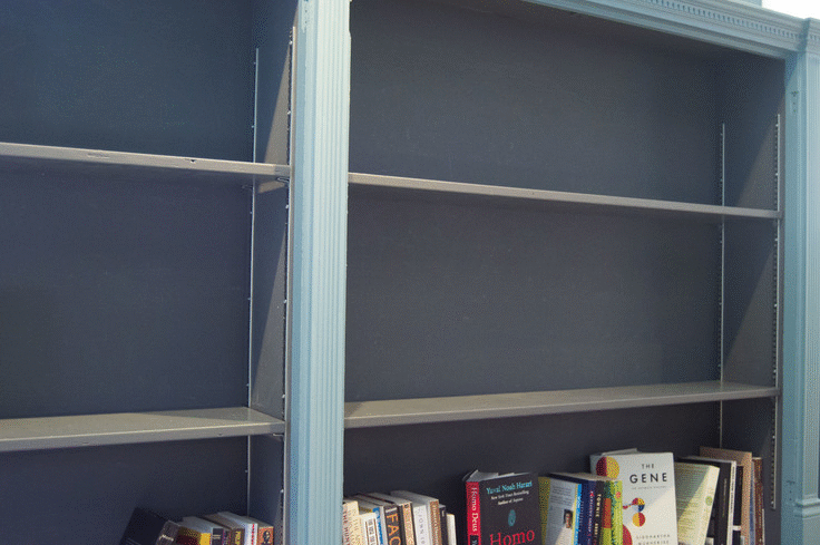 People's Library shelves filling with books.