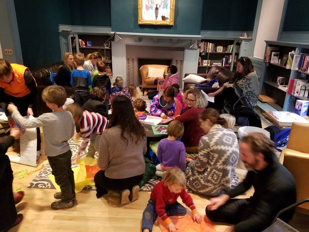 Children ages 5-10 in WCMA's Reading Room during a Social Justice storytime led by Peggy Kern. Social Justice Storytime