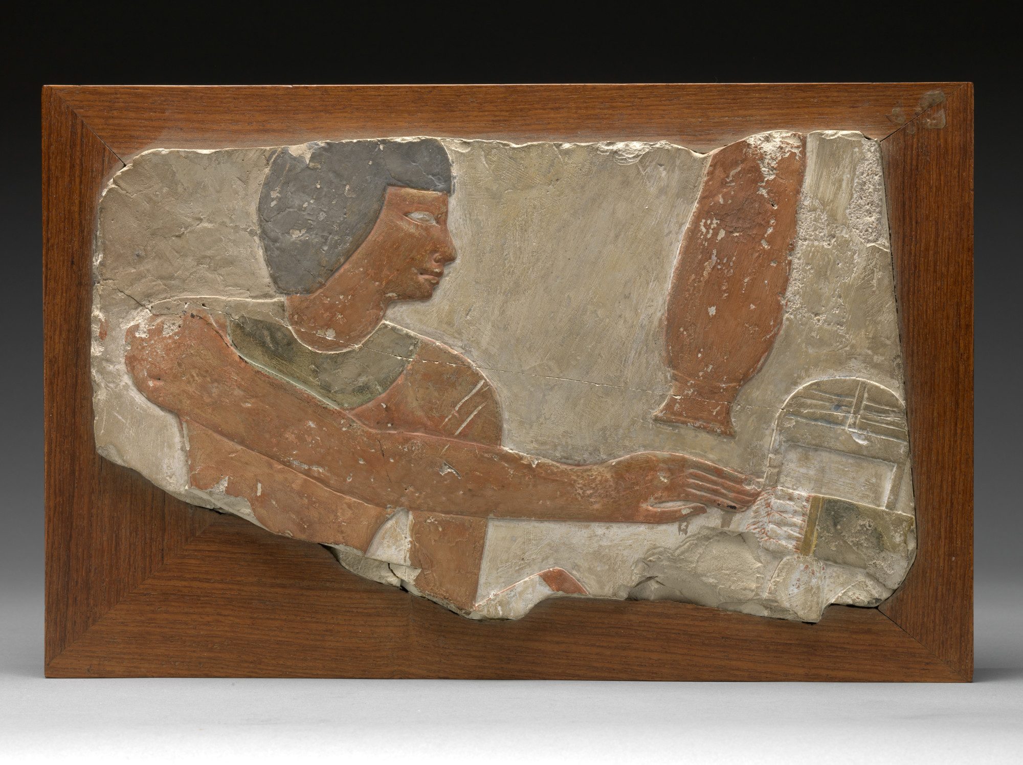 Servant with Offerings Egyptian, ca. 1500 BCE. Polychrome limestone. Gift of Horace L. Mayer, 60.23