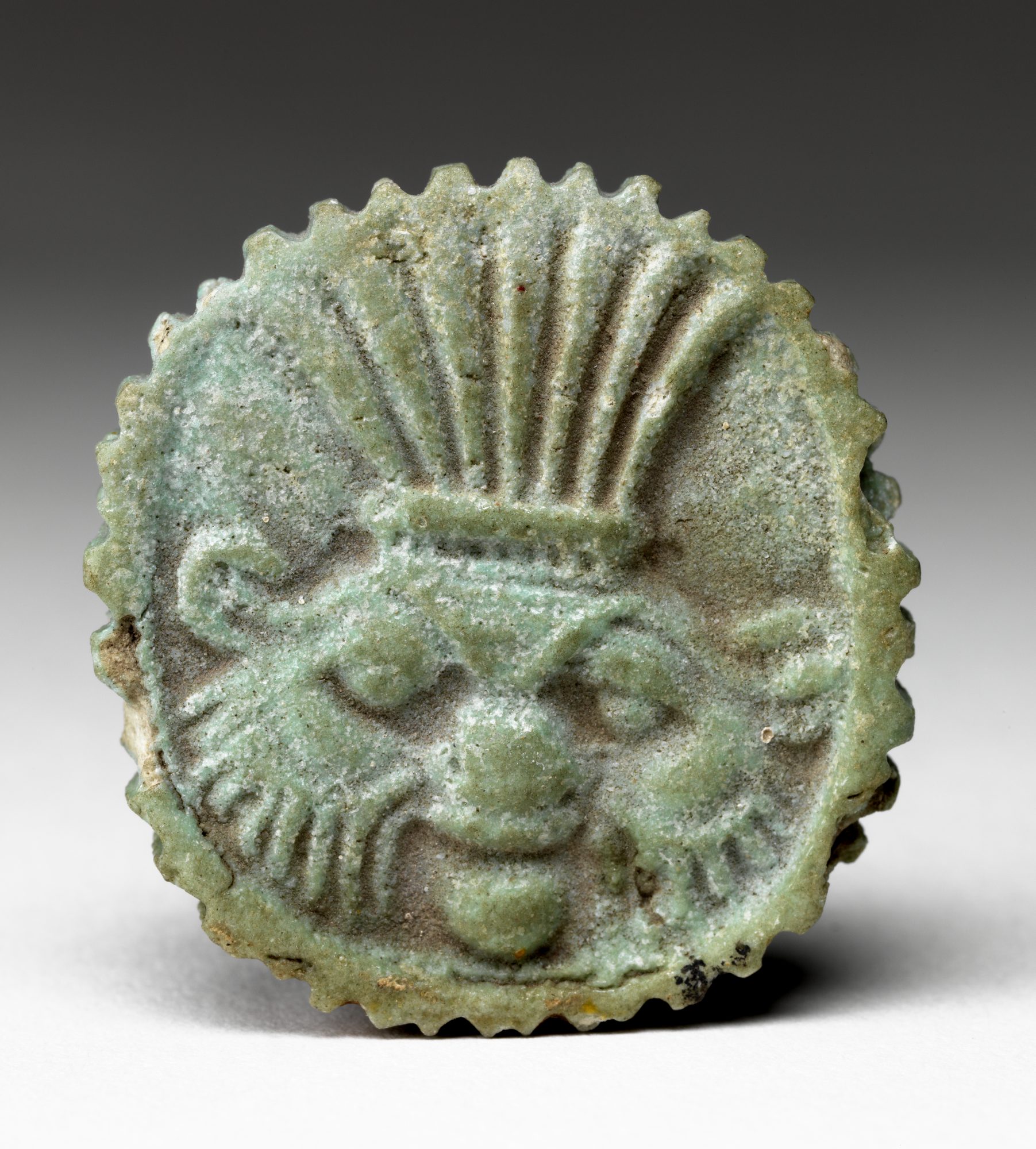 Unknown artist (Egyptian) Amulet of Deity with Headdress, Date unknown. Faience. Gift of Horace Mayer, 61.19.1.G