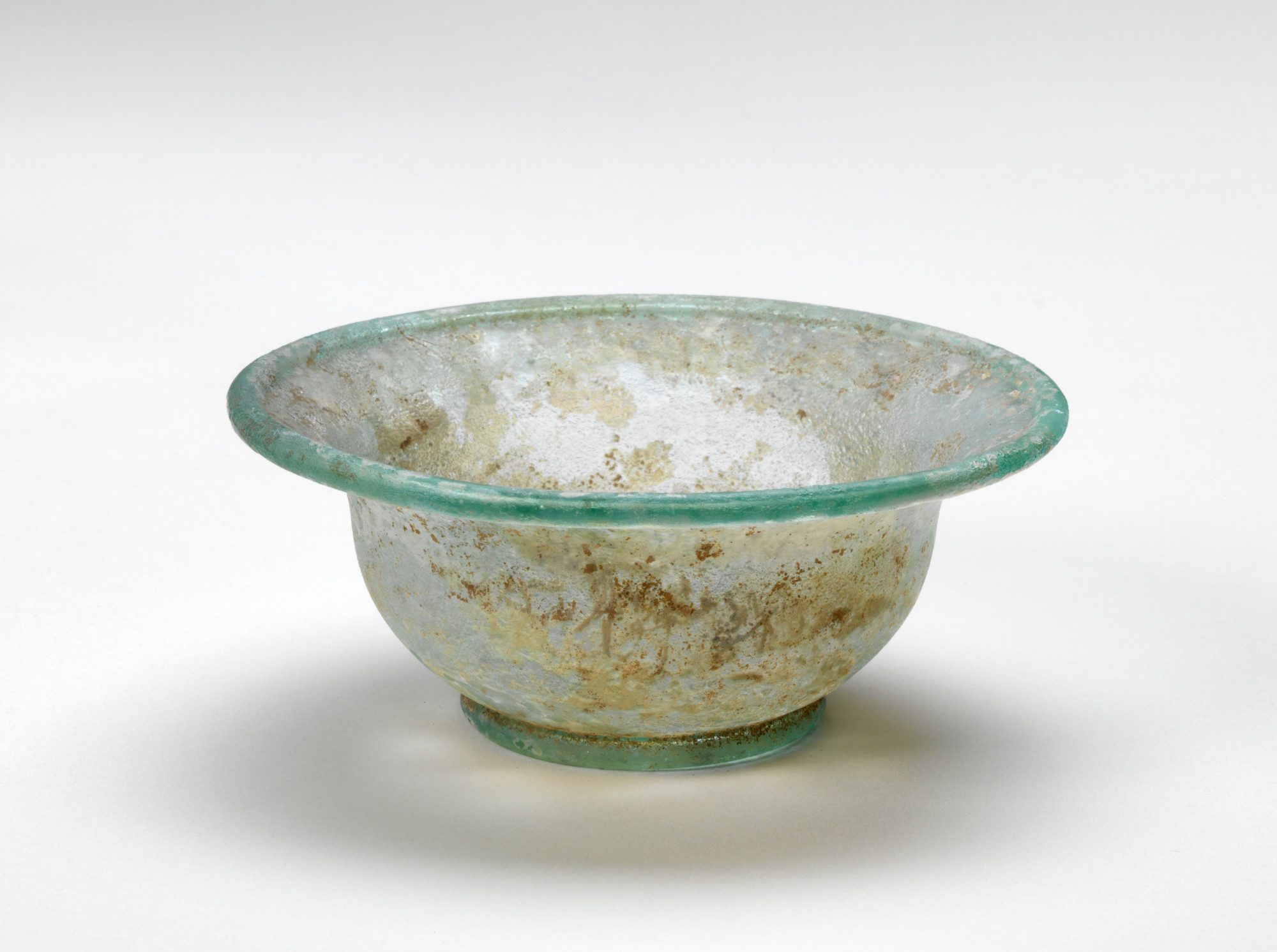 Syrian, wide-rimmed bowl, 1-299 AD. Free-blown glass, rim: 4 3/16 in. Gift of Mrs. Charles T. Cook, 30.1.16. Syrian, wide-rimmed bowl, 1-299 AD. Free-blown glass, rim: 4 3/16 in. Gift of Mrs. Charles T. Cook, 30.1.16.