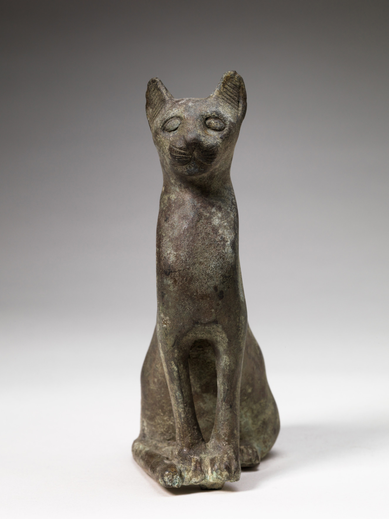 Egyptian, Cat, Greco-Roman Period (332 BC-32 AD). Bronze, 5 3/16 x 1 15/16 x 3 5/16 in. Gift of the son and daughters of Charles Bolles-Rogers, Class of 1907: Frederick Van D. Rogers, Mary Rogers Savage, and Nancy Rogers Pierson, 75.43.18. Egyptian, Cat, Greco-Roman Period (332 BC-32 AD). Bronze, 5 3/16 x 1 15/16 x 3 5/16 in. Gift of the son and daughters of Charles Bolles-Rogers, Class of 1907: Frederick Van D. Rogers, Mary Rogers Savage, and Nancy Rogers Pierson, 75.43.18.