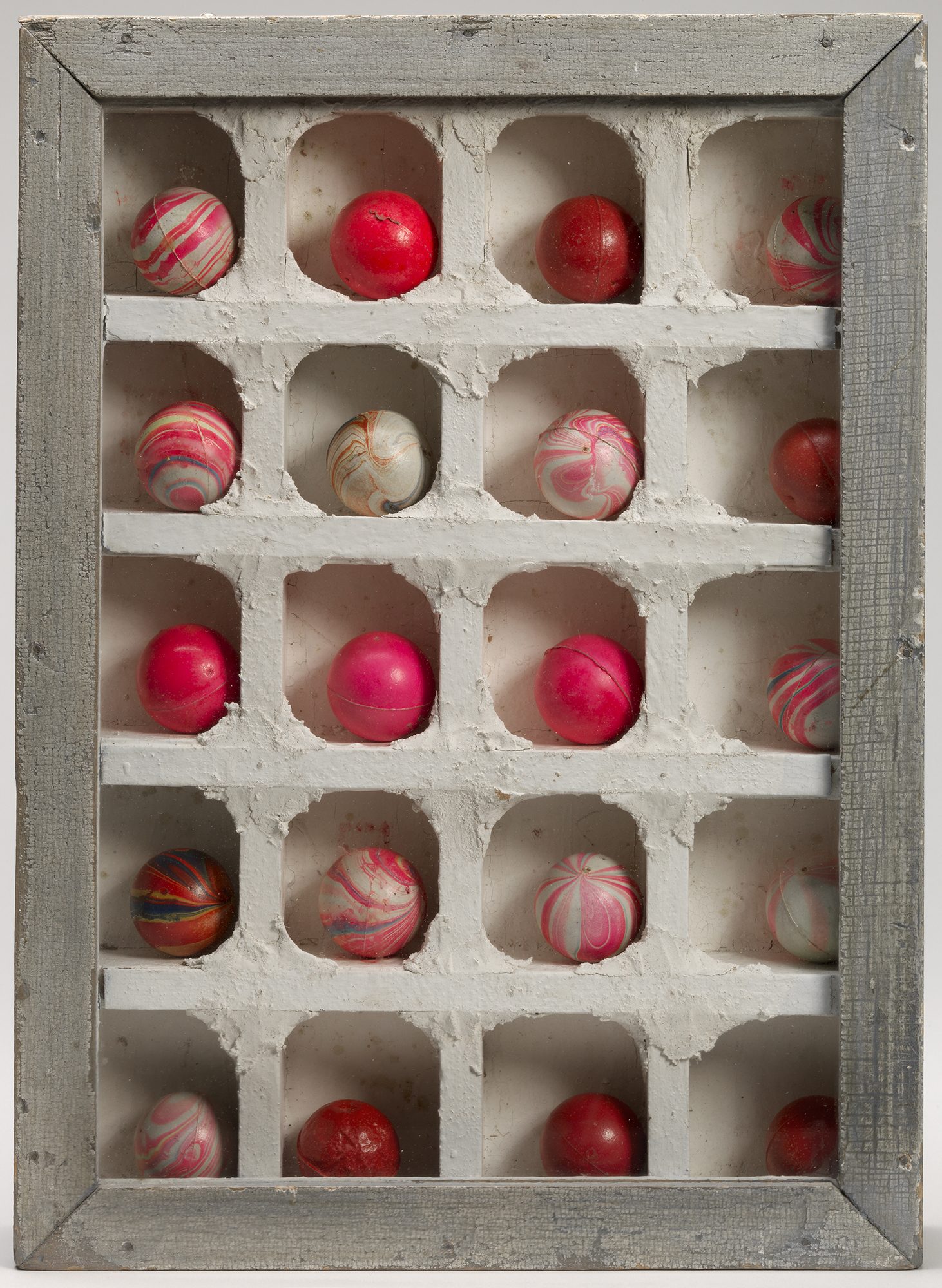 Joseph Cornell, (American, 1903-1972), Untitled, no date. Wood, glass, rubber balls and plaster, 14 13/16 x 11 x 2 5/16 in. Gift of Mrs. John A. Benton, 73.22.
Joseph Cornell, (American, 1903-1972), Untitled, no date. Wood, glass, rubber balls and plaster, 14 13/16 x 11 x 2 5/16 in. Gift of Mrs. John A. Benton, 73.22.