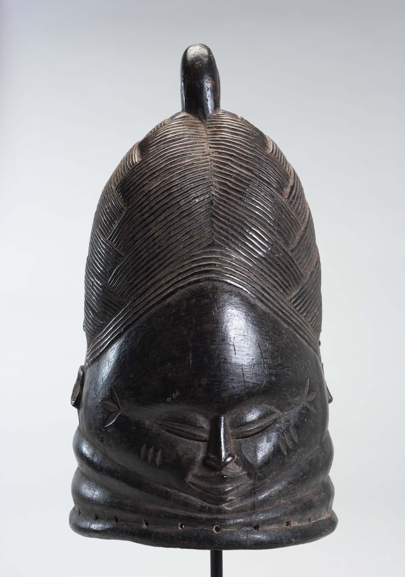 Unknown Arist (Mende People) Sande (Bondo) Society Mask, 20th century. Wood, 15 1/2 x 8 x 9 1/2 in. Gift of Dr. Oliver E. and Pamela F. Cobb, M.2005.16.3 Unknown Arist (Mende People) Sande (Bondo) Society Mask, 20th century. Wood, 15 1/2 x 8 x 9 1/2 in. Gift of Dr. Oliver E. and Pamela F. Cobb, M.2005.16.3