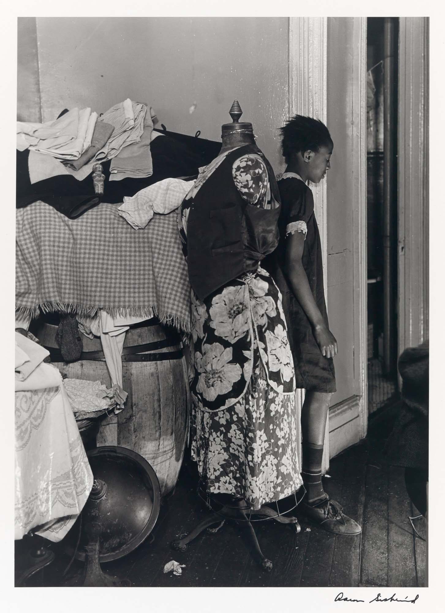 Aaron Siskind (American, 1903–1991) Girl with Clothes Form from the series “Harlem Document,” 1937. Gelatin silver print, 13 13/16 x 10 13/16 in. Gift of Mr. and Mrs. Richard R. Jeffrey, Class of 1952, 92.21.29 Aaron Siskind (American, 1903–1991) Girl with Clothes Form from the series “Harlem Document,” 1937. Gelatin silver print, 13 13/16 x 10 13/16 in. Gift of Mr. and Mrs. Richard R. Jeffrey, Class of 1952, 92.21.29