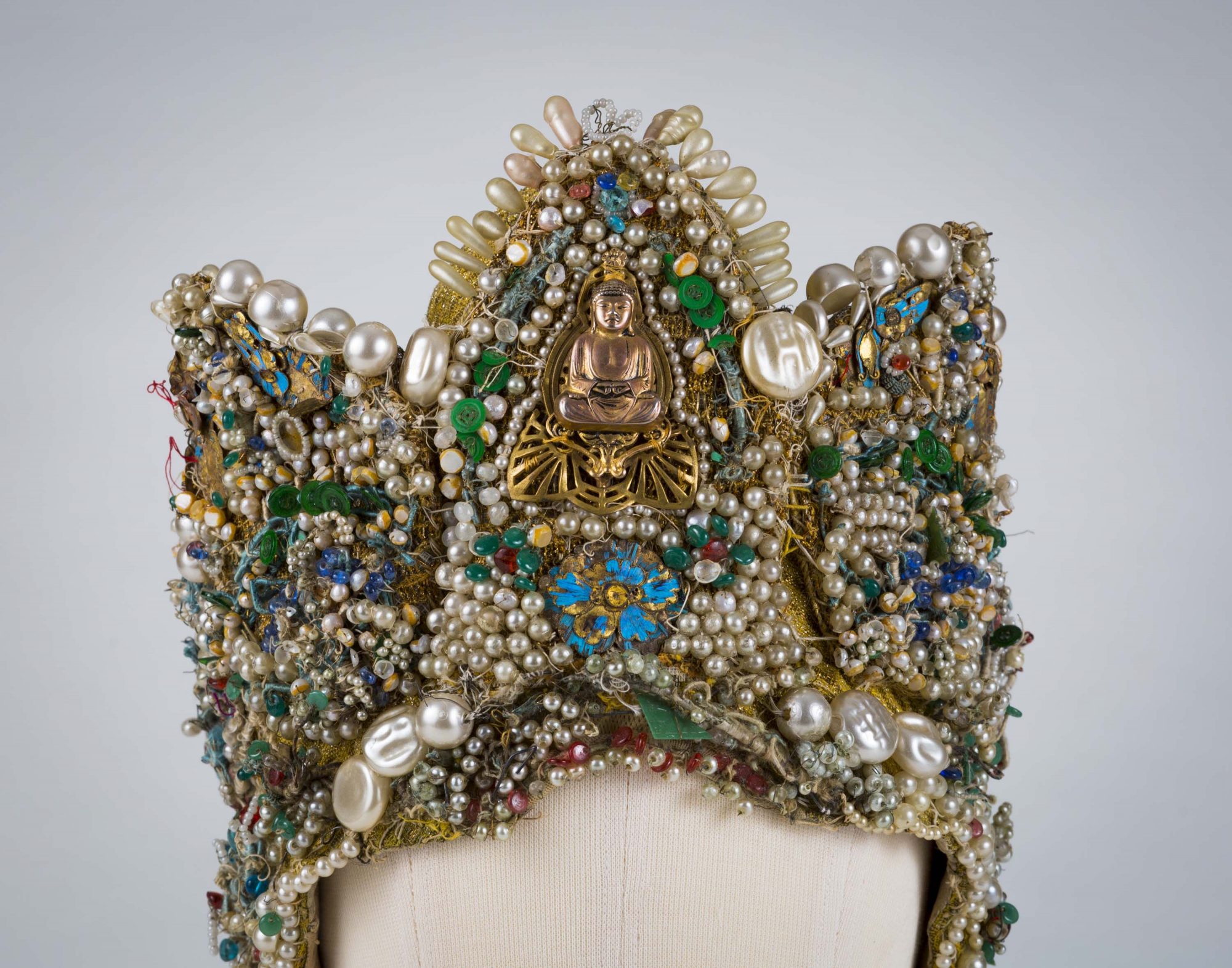Headdress, 1919 with later additions. Beads, buttons, costume jewelry, and feathers. Photo by David Dashiell.